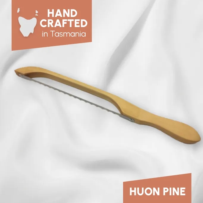 https://res.cloudinary.com/media-marketing-group/image/upload/v1774234746/Shop%20Tasmania/eCommerce%20Clients/gnfaure/4_GNFaure_Fiddle_Bow_Bread_Knife_Right_Handed__Huon_Pine_Variant_Image_h4i4wr.webp