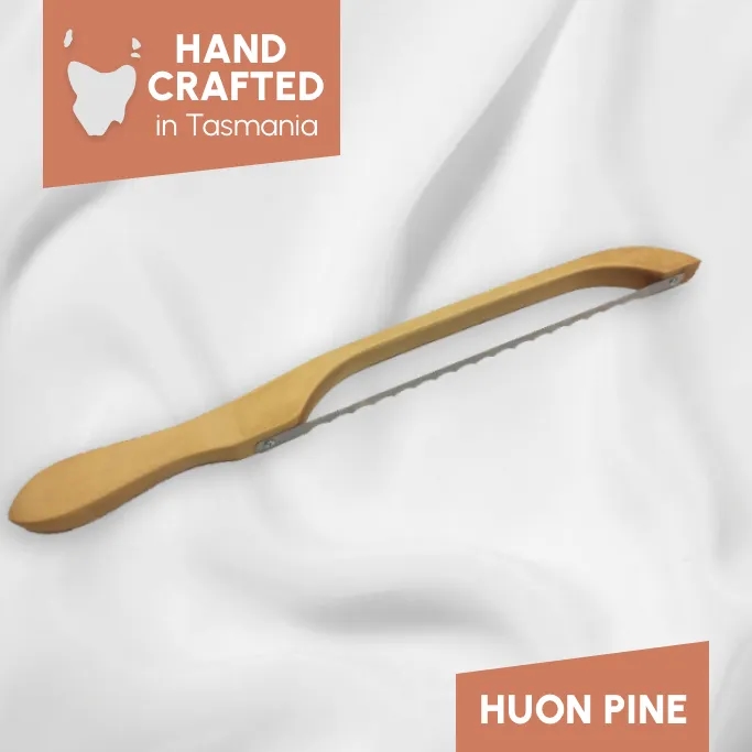 https://res.cloudinary.com/media-marketing-group/image/upload/v1774235479/Shop%20Tasmania/eCommerce%20Clients/gnfaure/4_GNFaure_Fiddle_Bow_Bread_Knife_Left_Handed__Huon_Pine_Variant_Image_vfqnce.webp